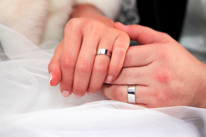 The groom keep the bride for hands