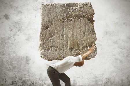 man_carrying_huge_roc_450
