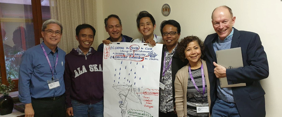 JCAP leadership group Fr Karel San Juan SJ, Fr Benny Juliawan SJ, Fr Jojo Magadia SJ, Fr Non Yamauchi SJ, Fr Adrianus Suyadi SJ and Dr Edna Franco with Fr John Dardis SJ