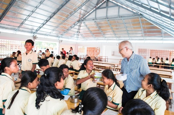 Fr Quyen Vu SJ with students