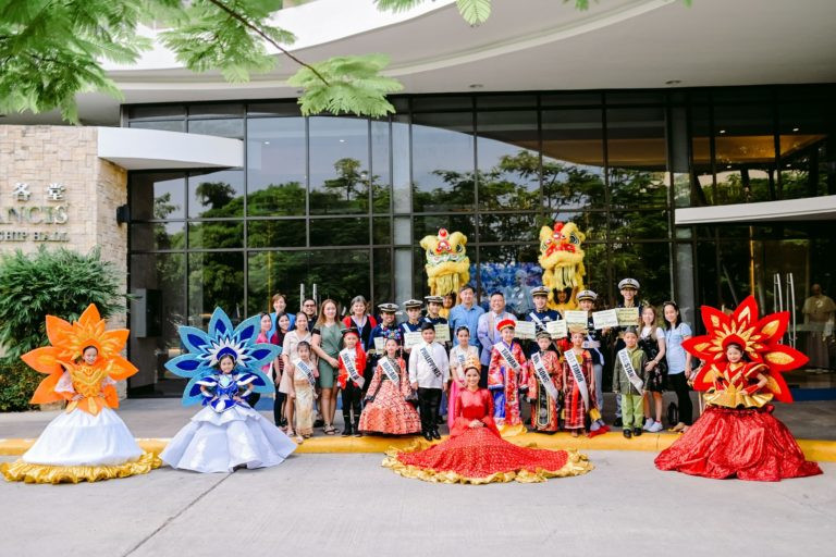 Students and faculty of Sacred Heart School-Ateneo de Cebu welcome the delegates on the first day of the workshop in full regalia