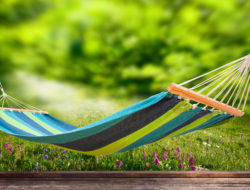 Relaxing on hammock in garden