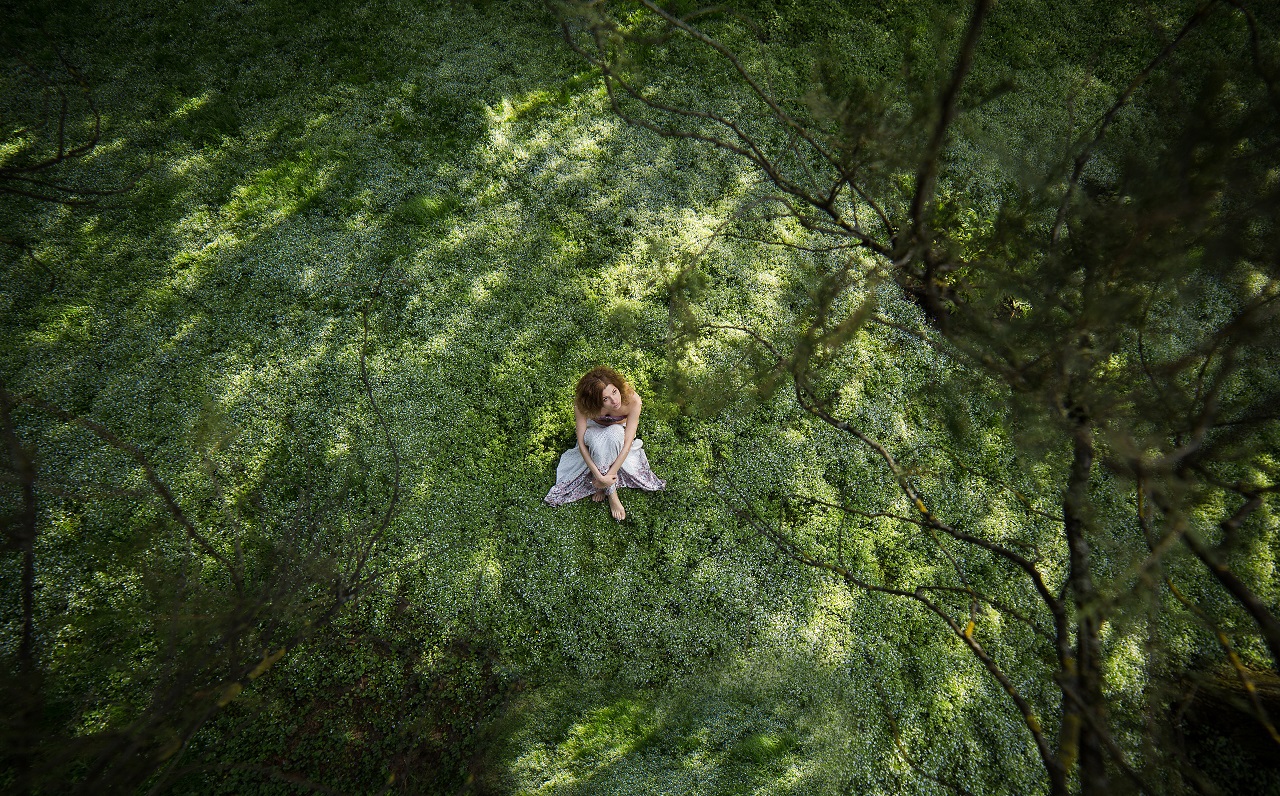 Girl in garden shooted from above