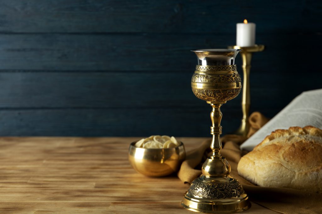 eucharist-with-wine-chalice-bread.Image by Freepik